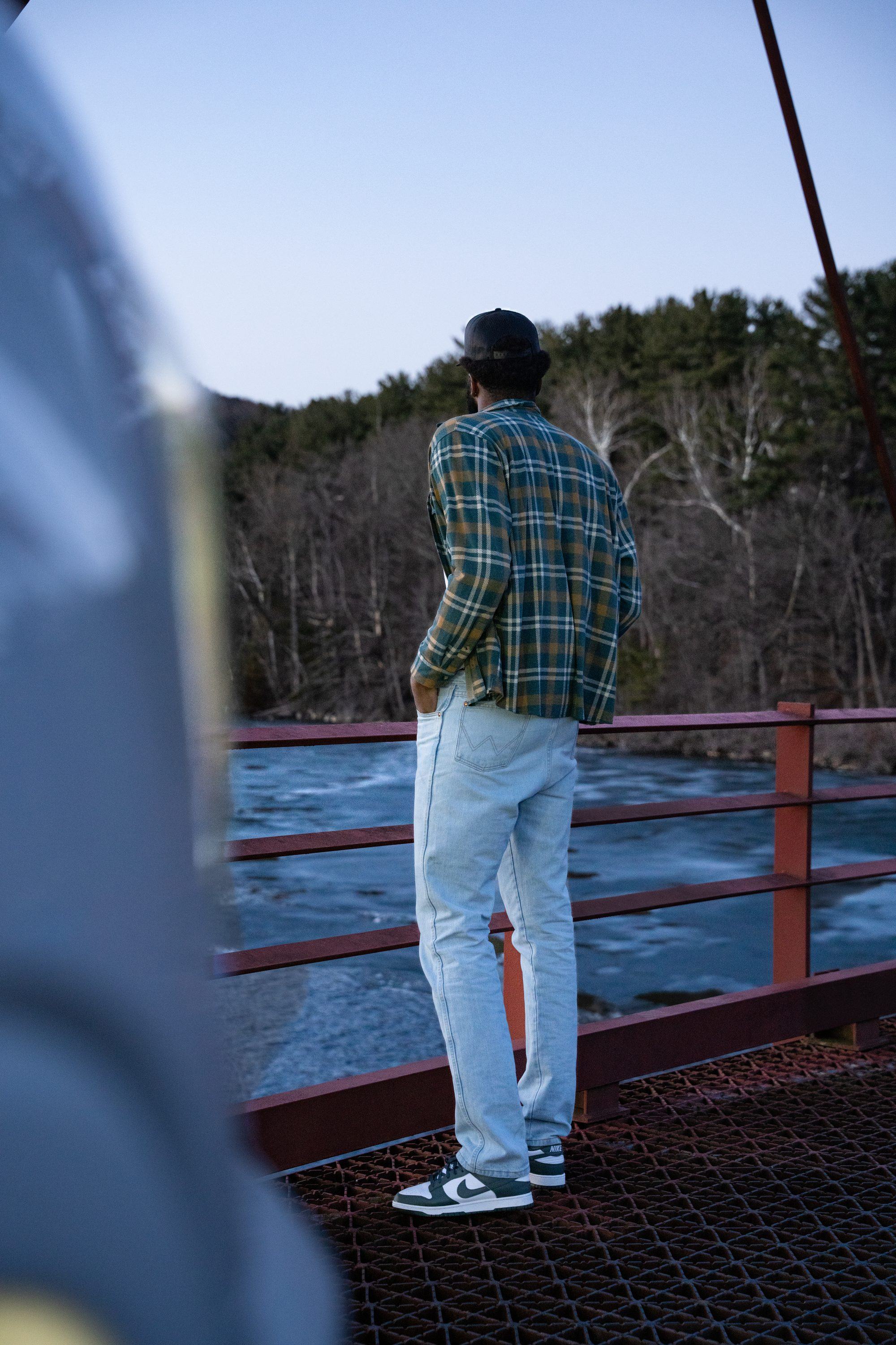 GMC truck on red bridge
