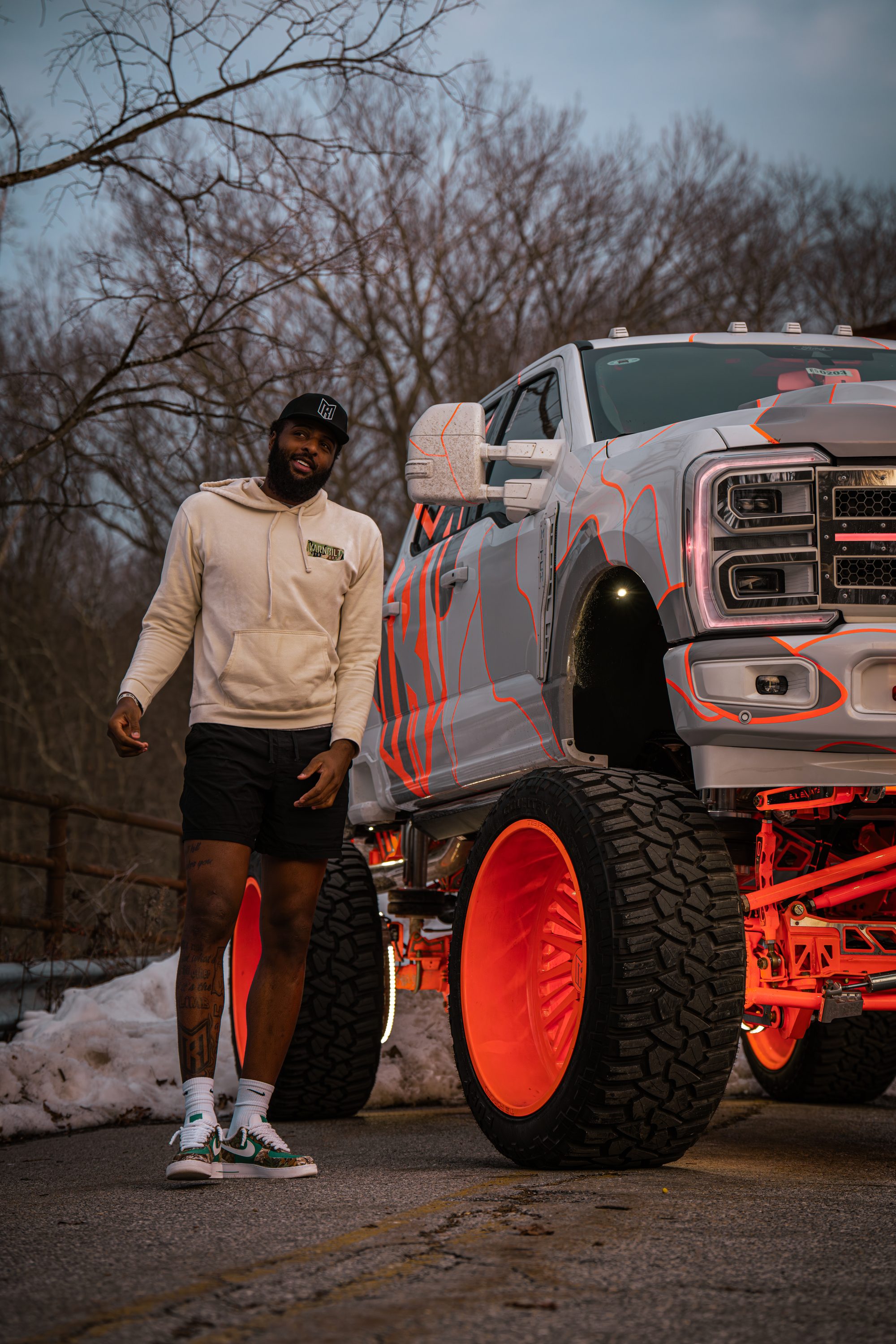 F250 truck in snow on a bridge